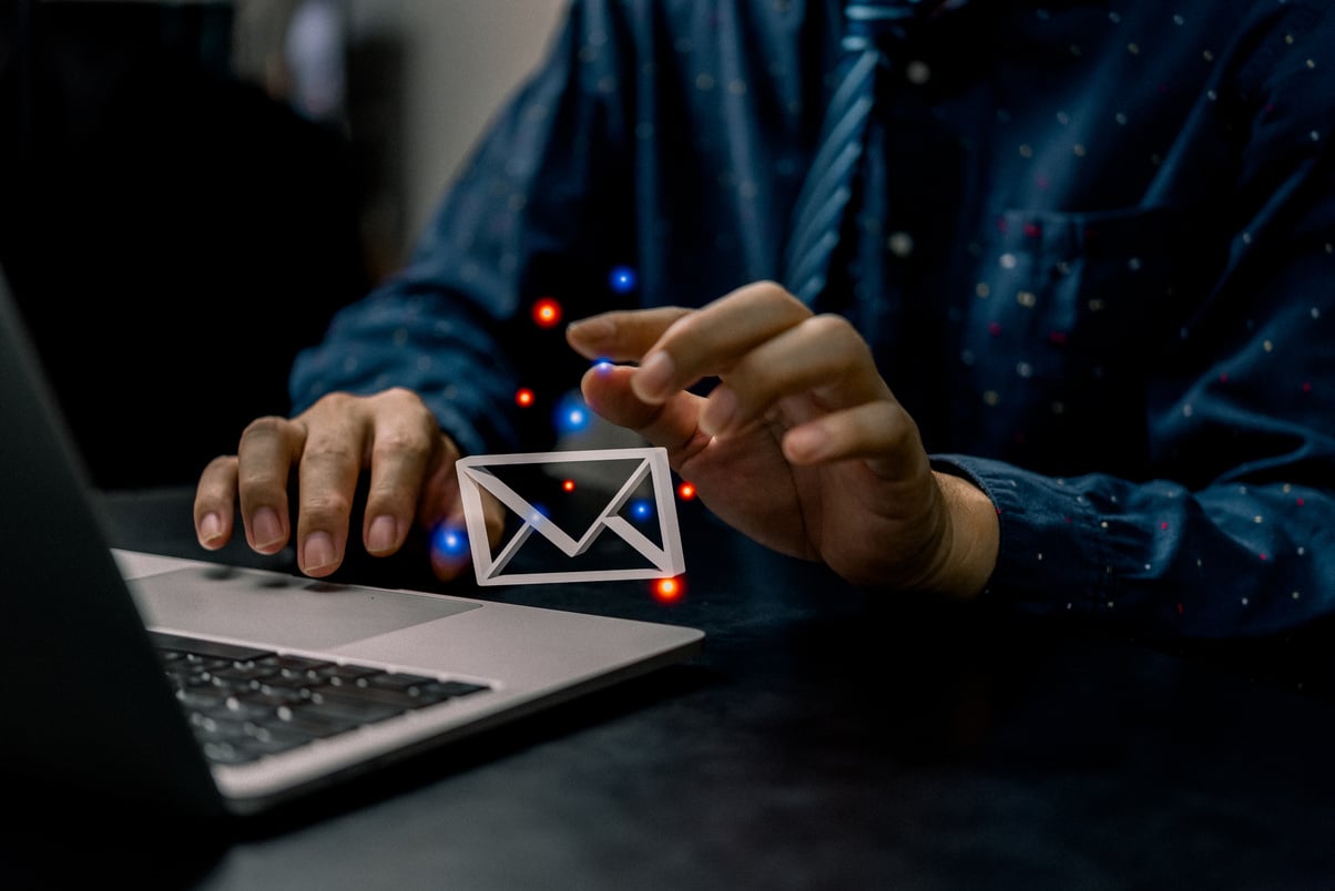 businessman using computer laptop and checking email icon 3D online or sending mail to partner and customer on web with virtual interface technology concept.